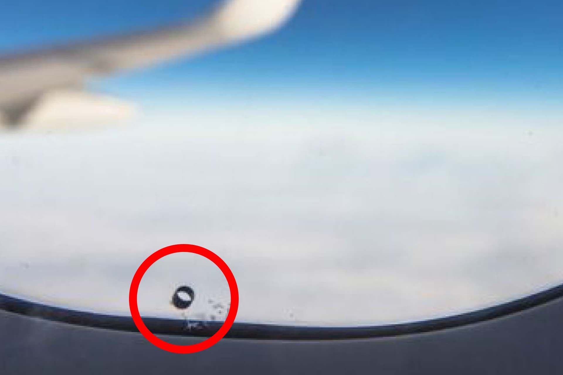 Airplane window holes
